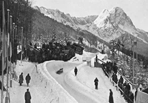 Bobsleighing, the first extended curve of the Olympic bobsleigh track in the midst of a magnificent snowy landscape