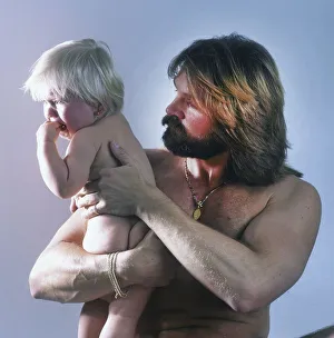 Bodybuilder with daughter. 80s