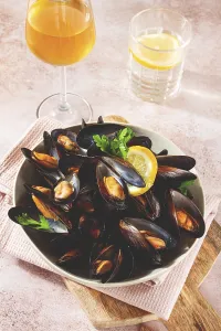 Boiled mussels, on a light table