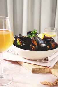 Boiled mussels, on a light table