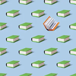 Books in green covers on a blue background