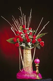 Bouquet, flowers arrangement of red roses with candle