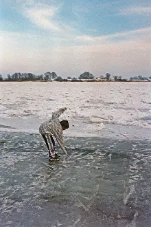 Boy on ice rink, frozen Elbe, Bleckede