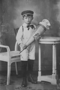 Boy with school cone, first day of school