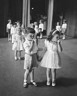 Boy shy with a girl, line up to dance