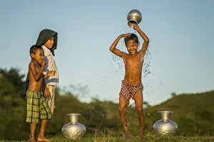 Boy washing himself, Mrauk U, Sittwe Division