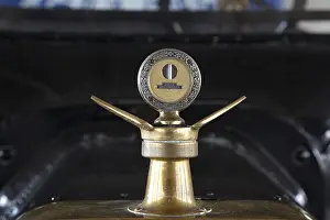 A Boyce Motometer hood ornament and radiator cap that measured the temperature of the water vapor in early cars