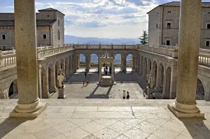 Bramante cloister with cistern and statues of St Benedict and St Scholastica of Nursia