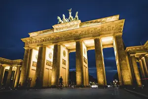 Brandenburg Gate at dusk, illuminated