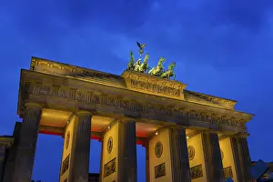 Brandenburg Gate illuminated at dusk