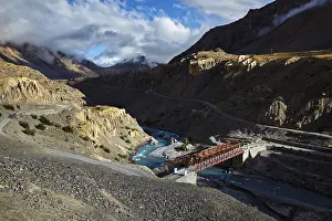 Bridge over Spiti river in Himalayas on sunset