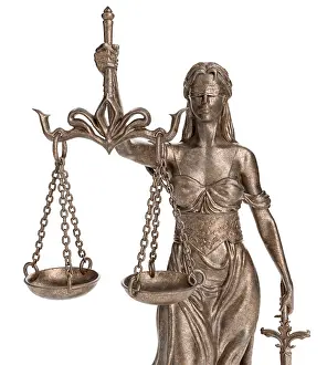 Bronze lady of justice statue isolated on a white background