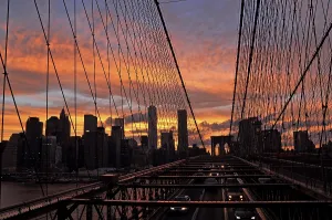 Brooklyn Bridge and Manhattan skyline at sunset