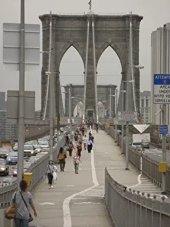 Brooklyn Bridge and walking pedestrians