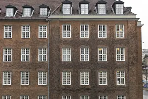 Framed Print : Brown Building with white windows in Denmark Framed Print : Brown Building with white windows in Denmark