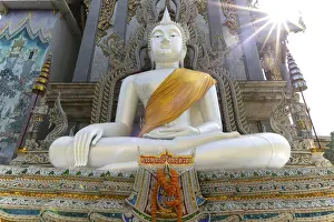 Buddha statue with tunic, Bhumispara mudra