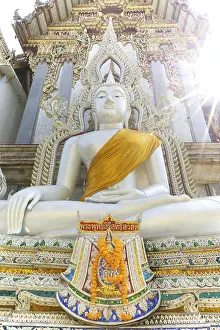 Buddha statue with tunic, Bhumispara mudra