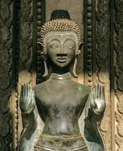 Category Buddhism Prints: Buddha statue in front of Wat Ho Prakeo