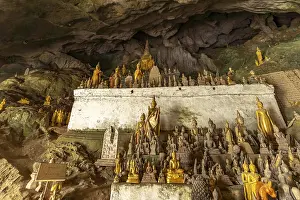 Buddha statues in the Pak Ou caves near Luang Prabang