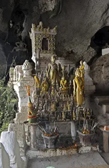 Buddha statues in the Pak Ou caves near Luang Prabang