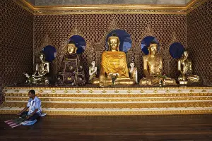Buddha statues in the Shwedagon Pagoda