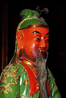 Buddhism, Confucianism, figure with green coat and long beard