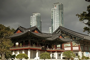 Buddhist Bongeunsa Temple in front of skyscrapers