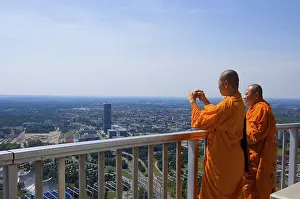 Buddhist monks on Olympic Tower