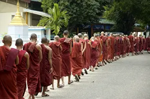 Many Buddhist monks stand in line Mahasi Meditation Centre Yangon Burma