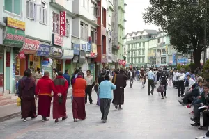 Category Buddhism Prints: Buddhist monks strolling in the pedestrian zone