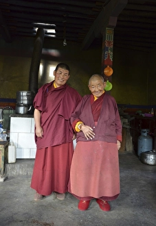 Category Buddhism Prints: Two Buddhist nuns, one middle-aged woman