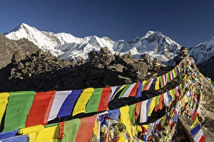 Category Mountain Landscapes Prints: Buddhist prayer flags marking the summit of Gokyo Ri