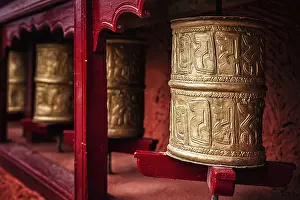 Category Buddhism Prints: Buddhist prayer wheels in Thiksey gompa (Tibetan buddhist monstery)