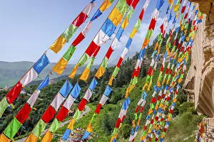 Buddhist praying flags at Mati Si cave temple