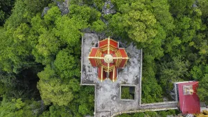 A buddhist temple on a mountain in Cambodia seen from above