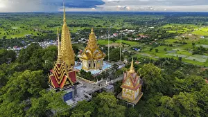A buddhist temple on a mountain in Cambodia seen from above