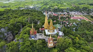 A buddhist temple on a mountain in Cambodia seen from above