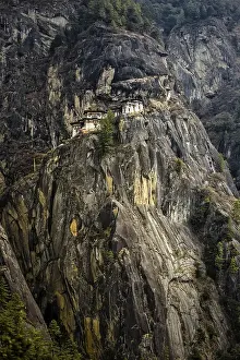 Category Buddhism Prints: Buddhist tiger nest monastery Taktshang on steep rock face