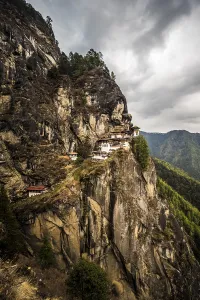 Buddhist tiger nest monastery Taktshang on steep rock face