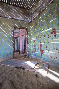 Building taken over by desert sand