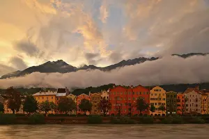 Buildings along the Inn river at dusk