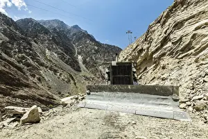 Bulldozer doing mountain road construction in Himalayas