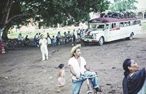 Bus stop with people selling refreshments, Muna, Yucatan Peninsula, Mexico, 1961, Central America