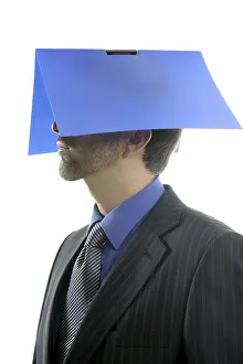 Businessman and blue folder over head