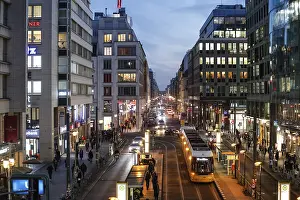 The busy FriedrichstraBe in Berlin at the blue hour
