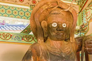 Buyeo, South Korea, July 7, 2018: Closeup of the Vajrapani Buddhist god Akshobhya carved over 100 years ago