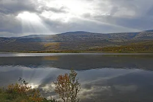 Category Mountain Landscapes Prints: A calm lake with mountains in the background
