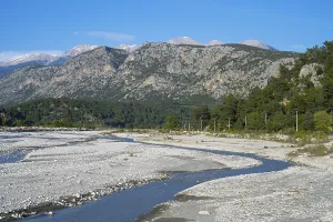 Framed Print : A calm river flows through a wide gravel bed