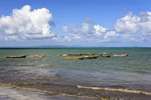 Calm sea with several small boats