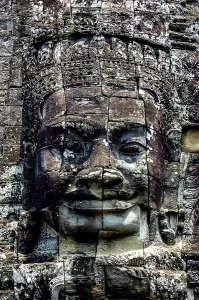 Cambodian gray rock sculpture in angkor wat, bayon